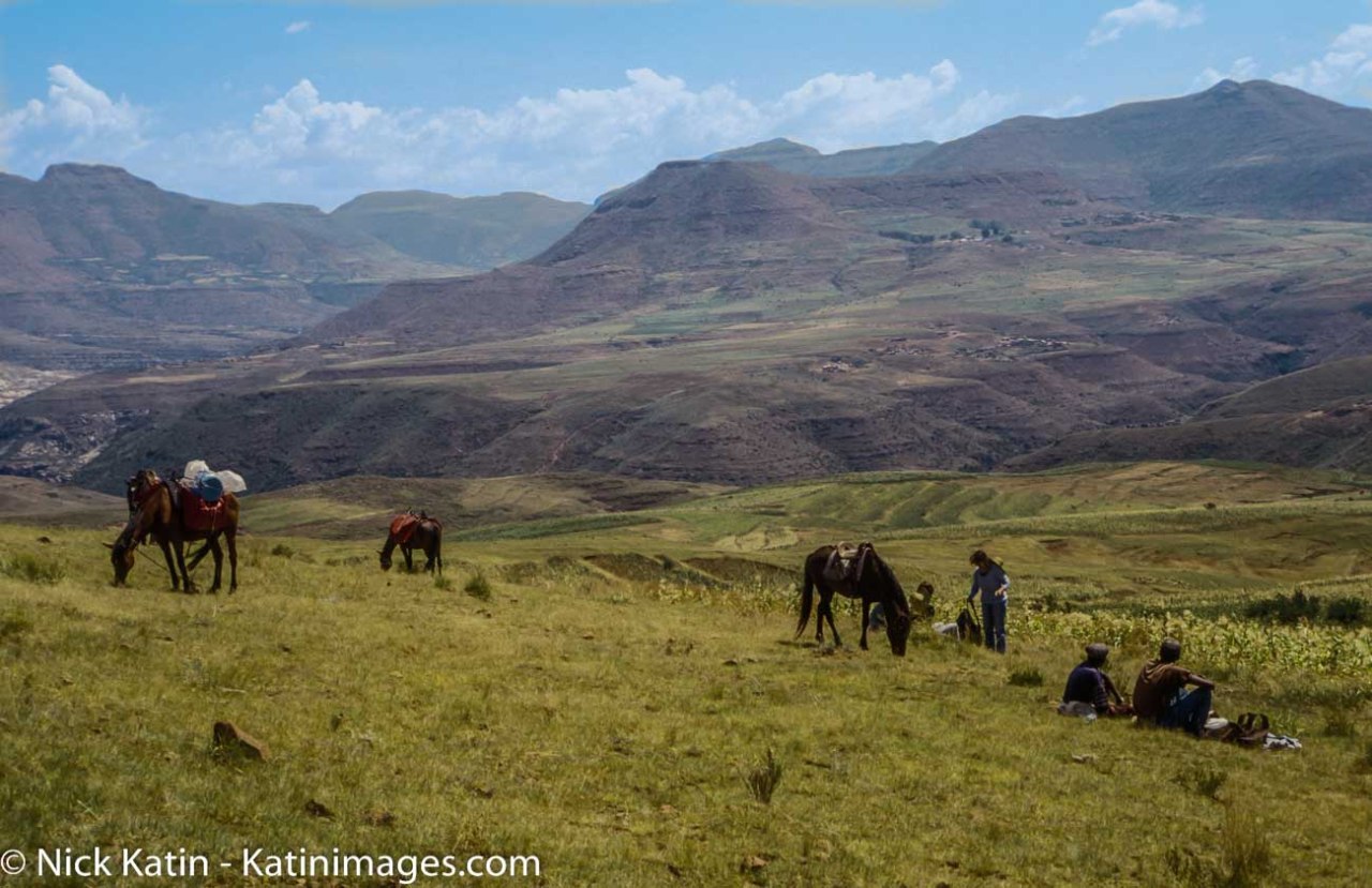 Ponies and Riders take a break with the backdrop of the Maloti Mountains of Lesotho.